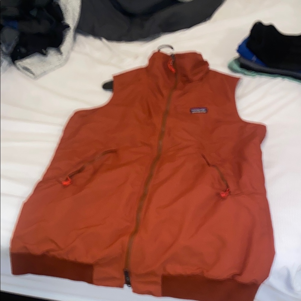 Patagonia Rust Orange Vest Women’s XXL Long bottom of the vest. Brand New